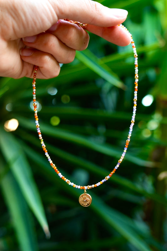 Collar circonitas con charm ojo